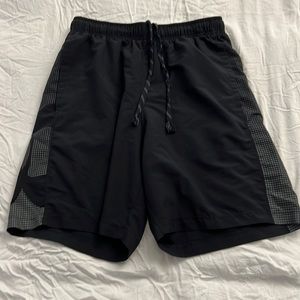 Black Under Armor athletic shorts.